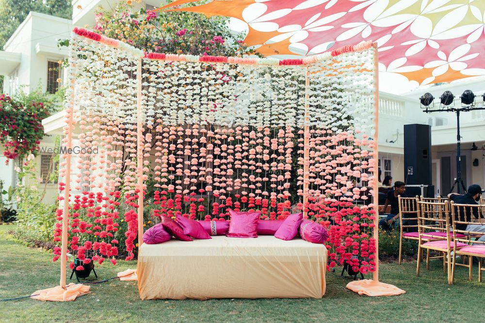 Photo of Ombre floral string backdrop for mehendi