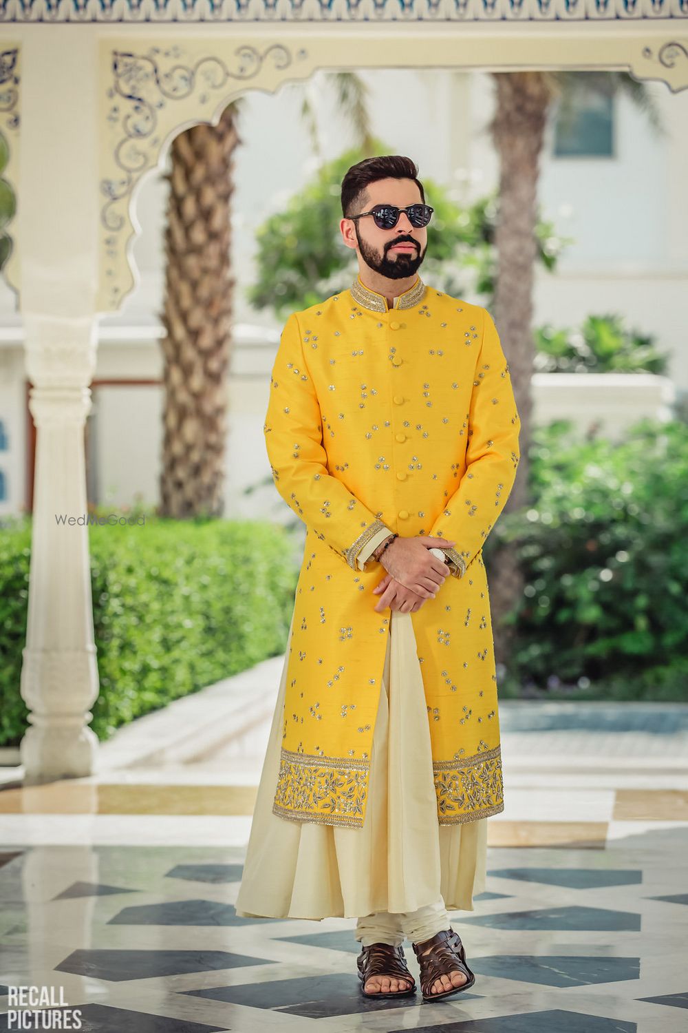 Photo of Offbeat groom in yellow manarkali