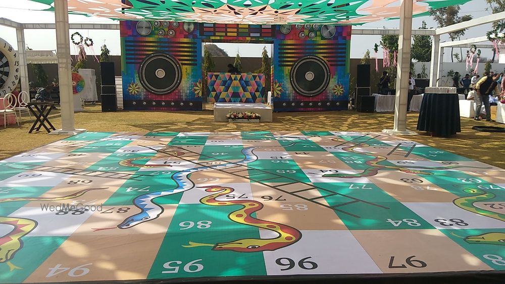 Photo of Giant snake and ladder game for guests.