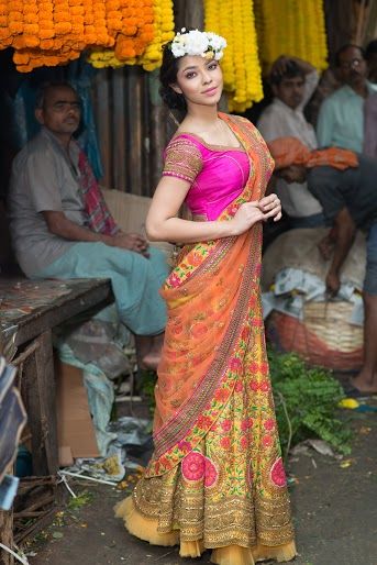 Photo of Olive gold and bright pink lehenga