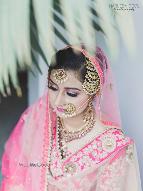 Photo of fuschia and peach bridal lehenga