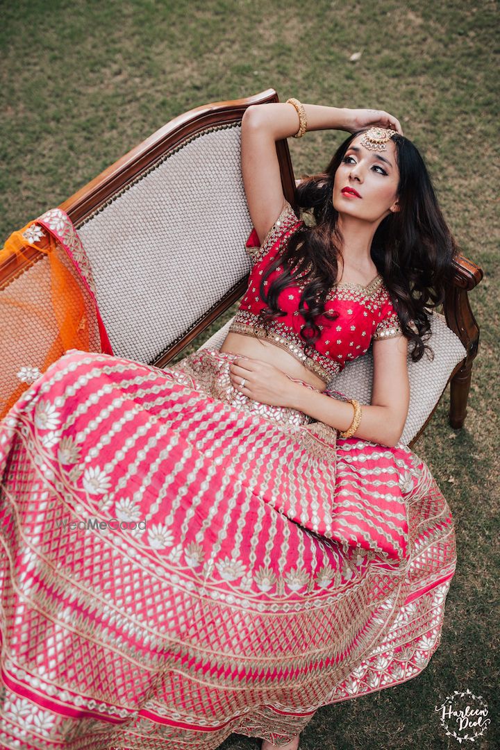 Photo of Bride posing in pink gota patti lehenga