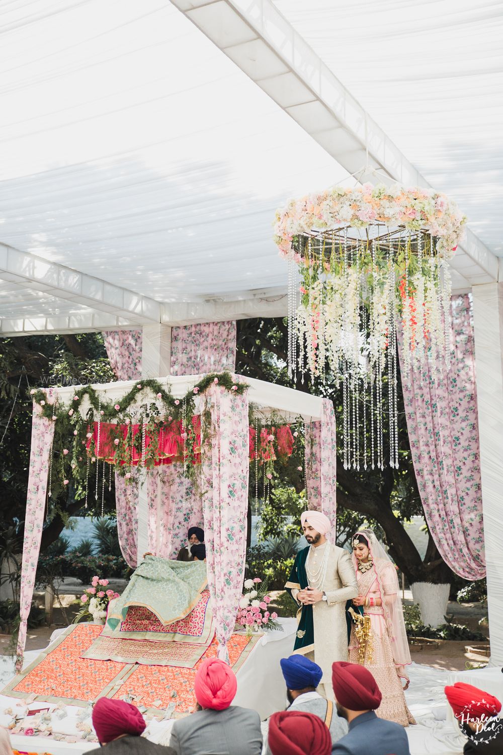 Photo of Mandap with floral drapes