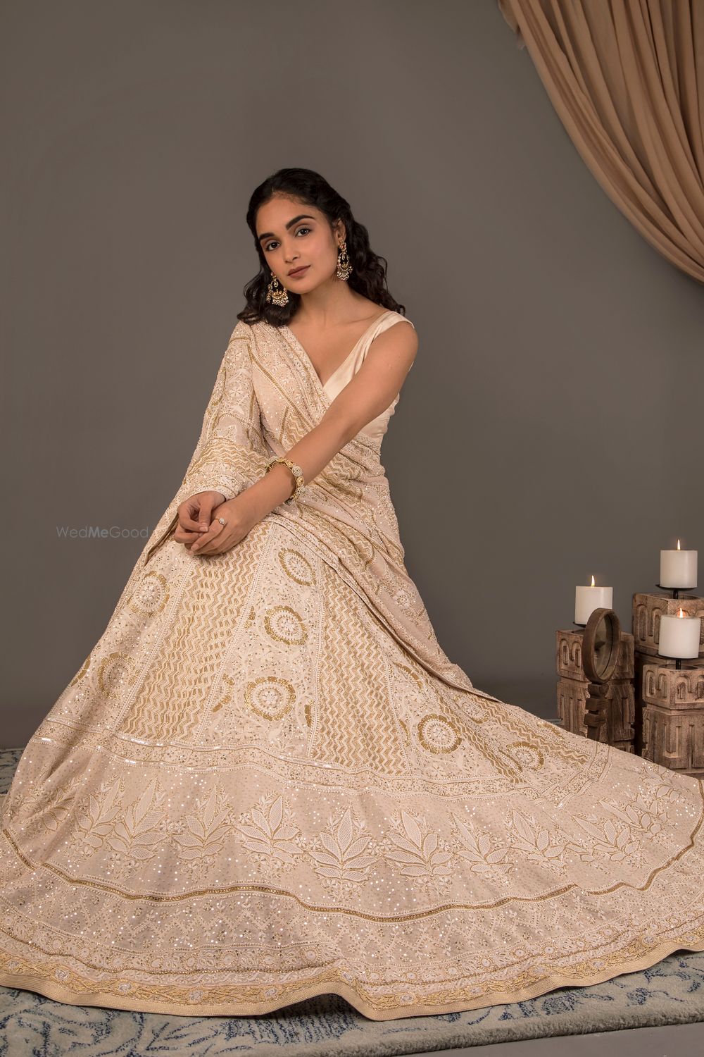 Photo of Ivory and gold chikankari lehenga.