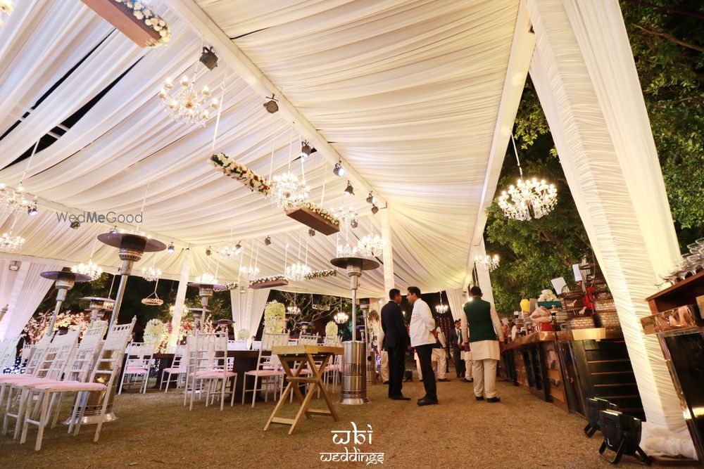 Photo of White theme decor with fairy lights.