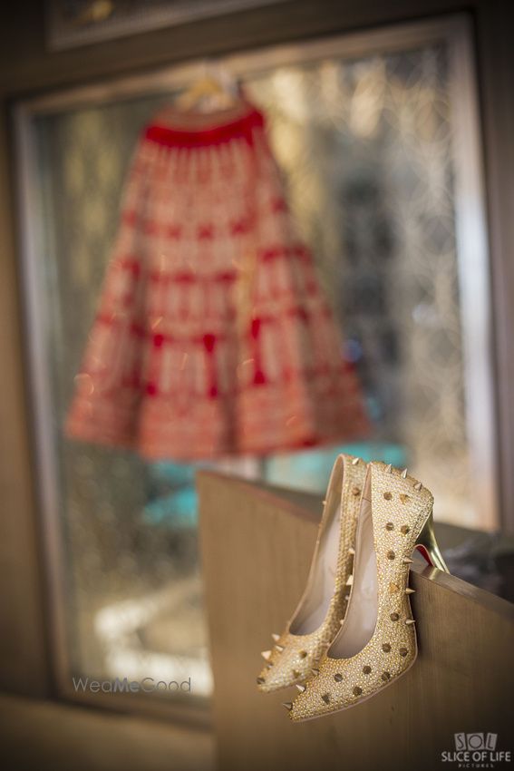 Photo of Unique gold bridal heels with spikes