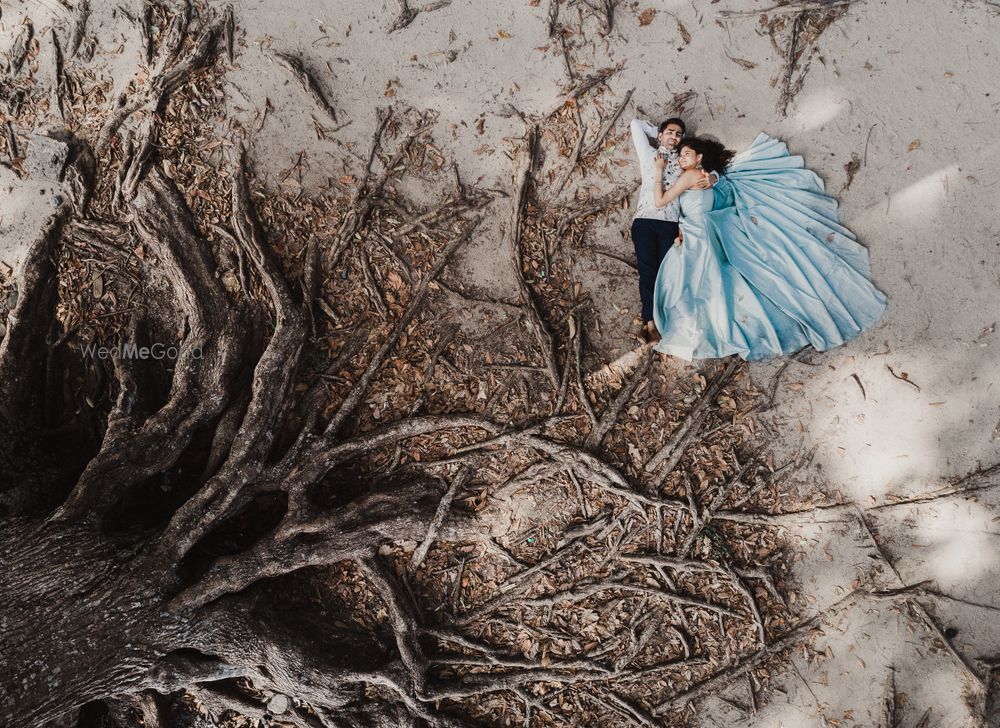 Photo of Stunning couple shot on a beach for a pre wedding shoot