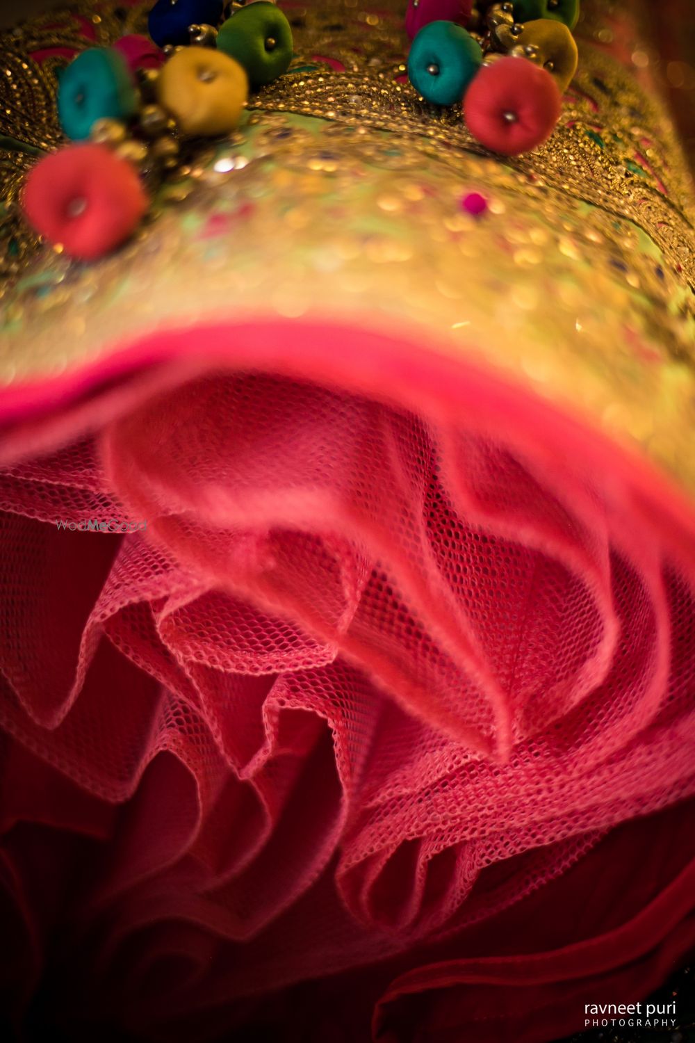 Photo of Bridal lehenga with red cancan and tassels