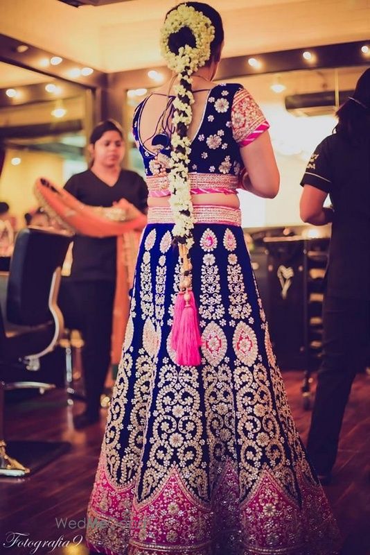 Photo of Indigo Blue and Hot Pink Lehenga with Gajra Hairstyle