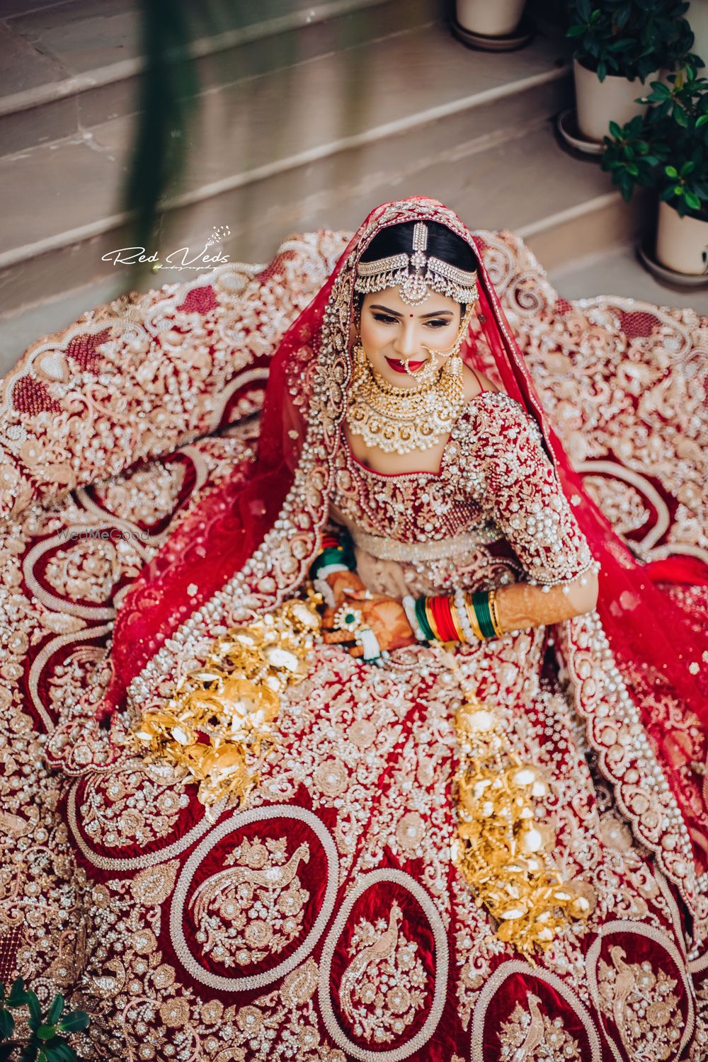 Photo of Heavily embroidered bridal lehenga top shot