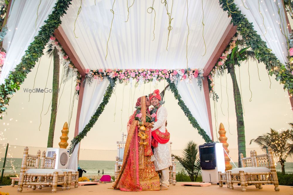 Photo of Simple mandap decor idea with drapes and florals