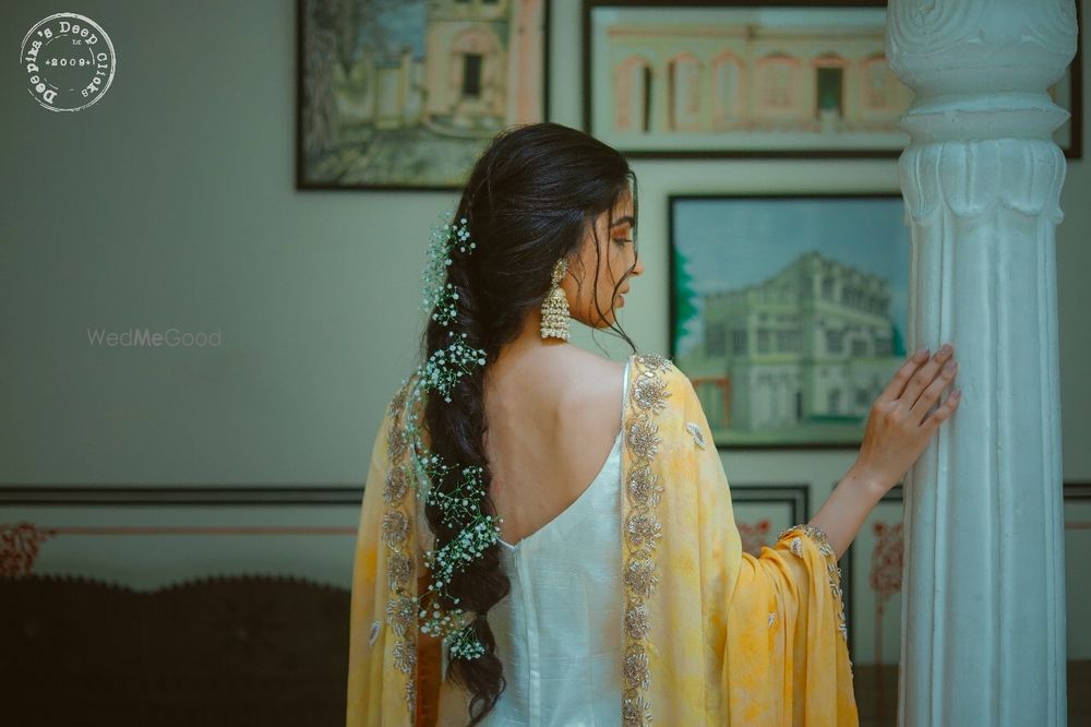 Photo of Unique mehendi braid with babys breath