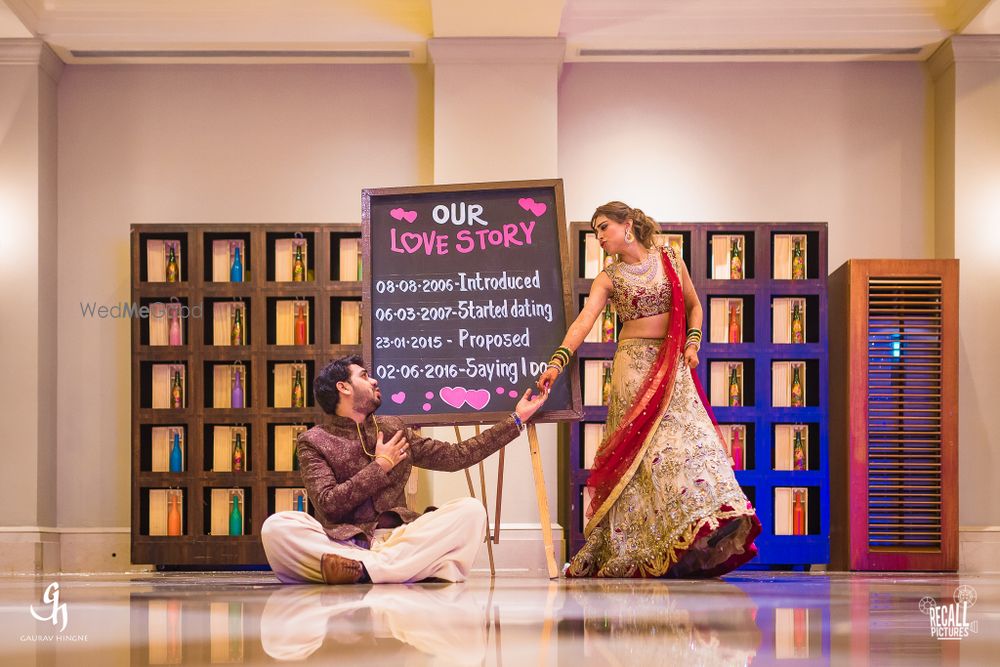 Photo of Couple with Chalkboard Love Story Board