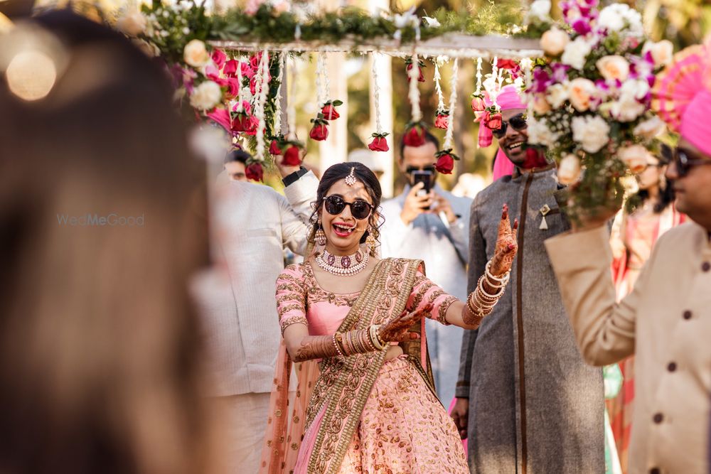 Photo of Dancing bridal entry under phoolon ka chadar