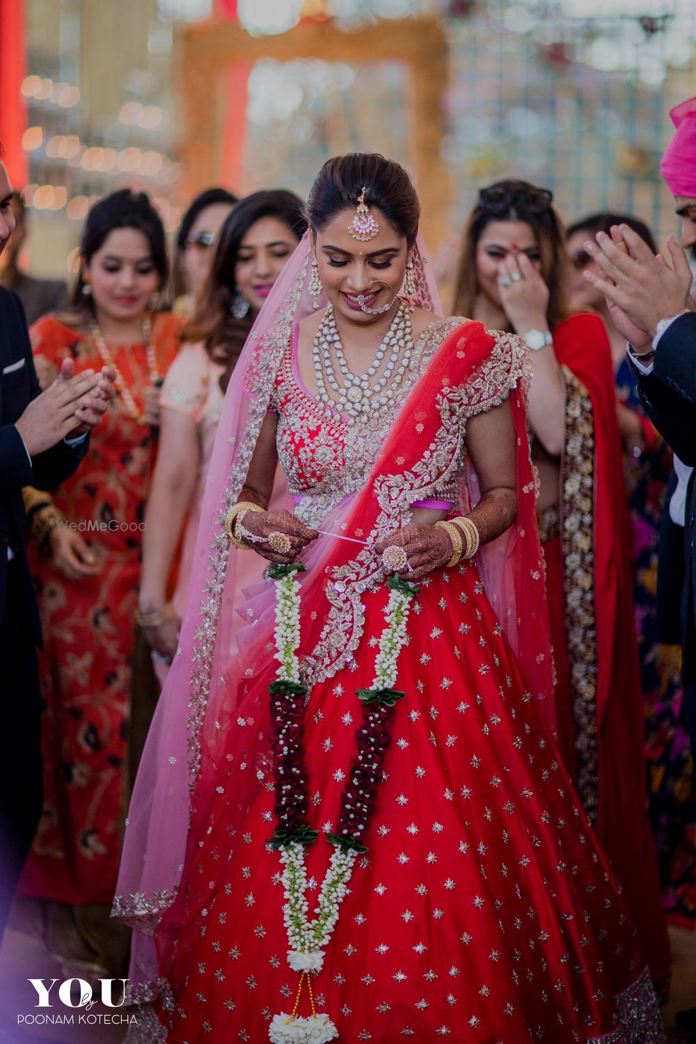 Photo of Light pink and red lehenga with scalloped edge