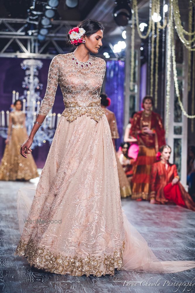 Photo of Tahiliani Shell Pink and Gold Lace Lehenga