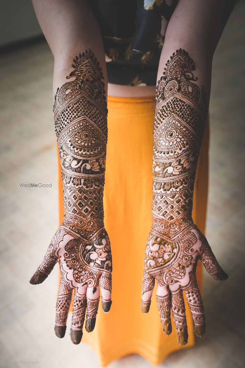 Photo of full arm mehendi design on both hands