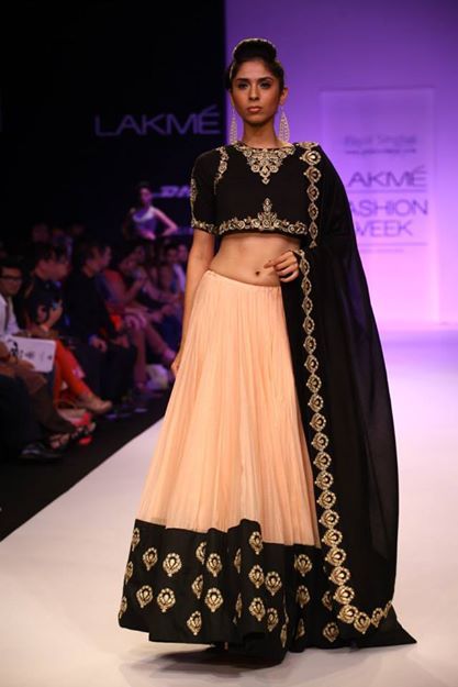 Photo of Payal Singhal blush and black lehenga with crop top