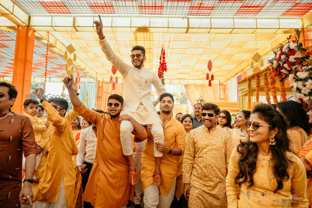 Photo of Groom entry with groomsmen