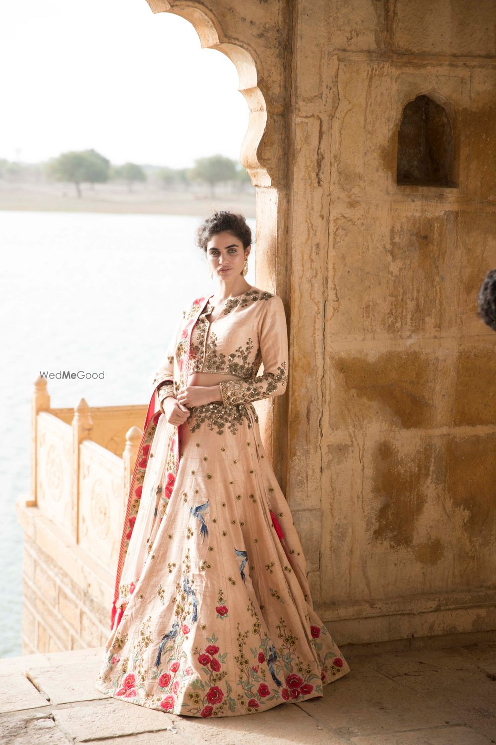 Photo of Blush pink lehenga with floral motifs and zardozi work