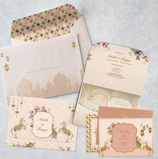 Photo of Taj mahal theme wedding invitation card in white and blush pink