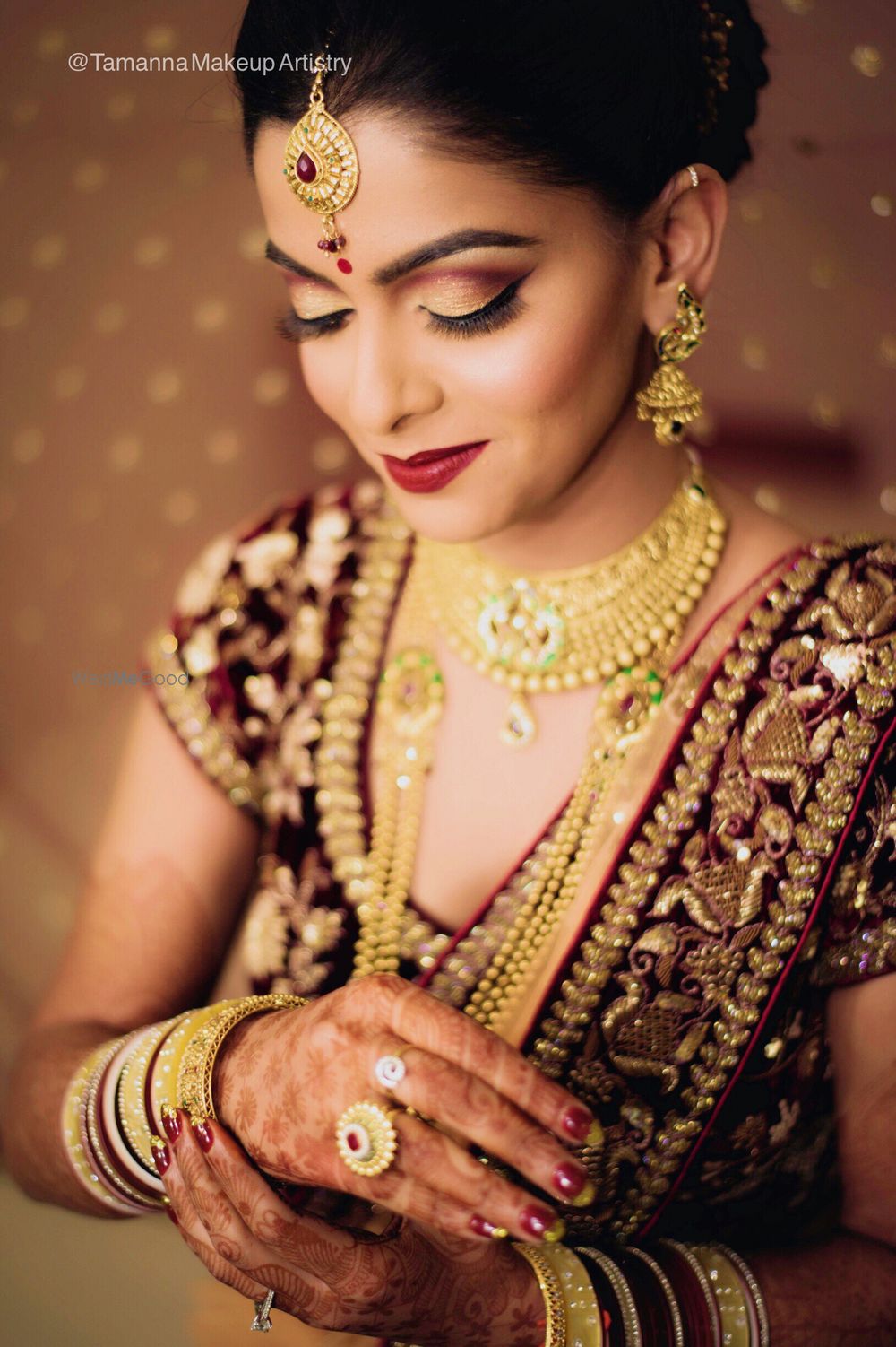 Photo of Maroon and gold makeup