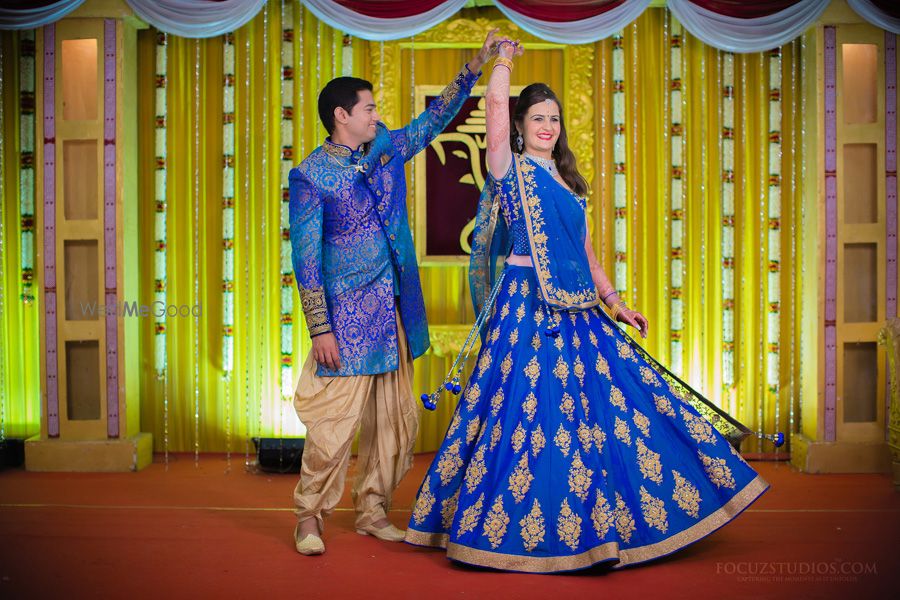 Photo of ink blue engagement lehenga