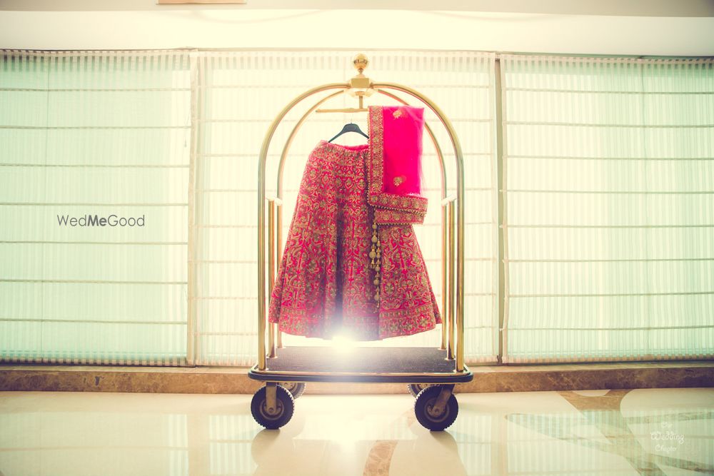 Photo of Lehenga on hanger at hotel trolley