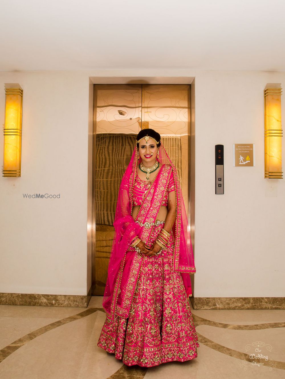 Photo of Bright pink bridal lehenga with floral embroidery