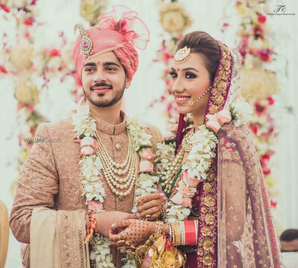 Photo of pink and gold sherwani