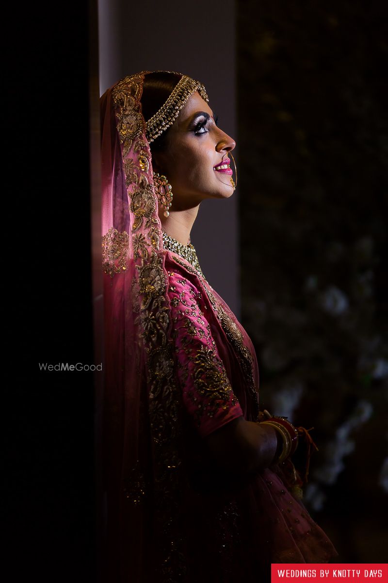 Photo of Bridal portrait with bride looking up