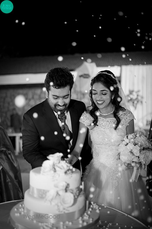 Photo of Christian couple cake cutting shot