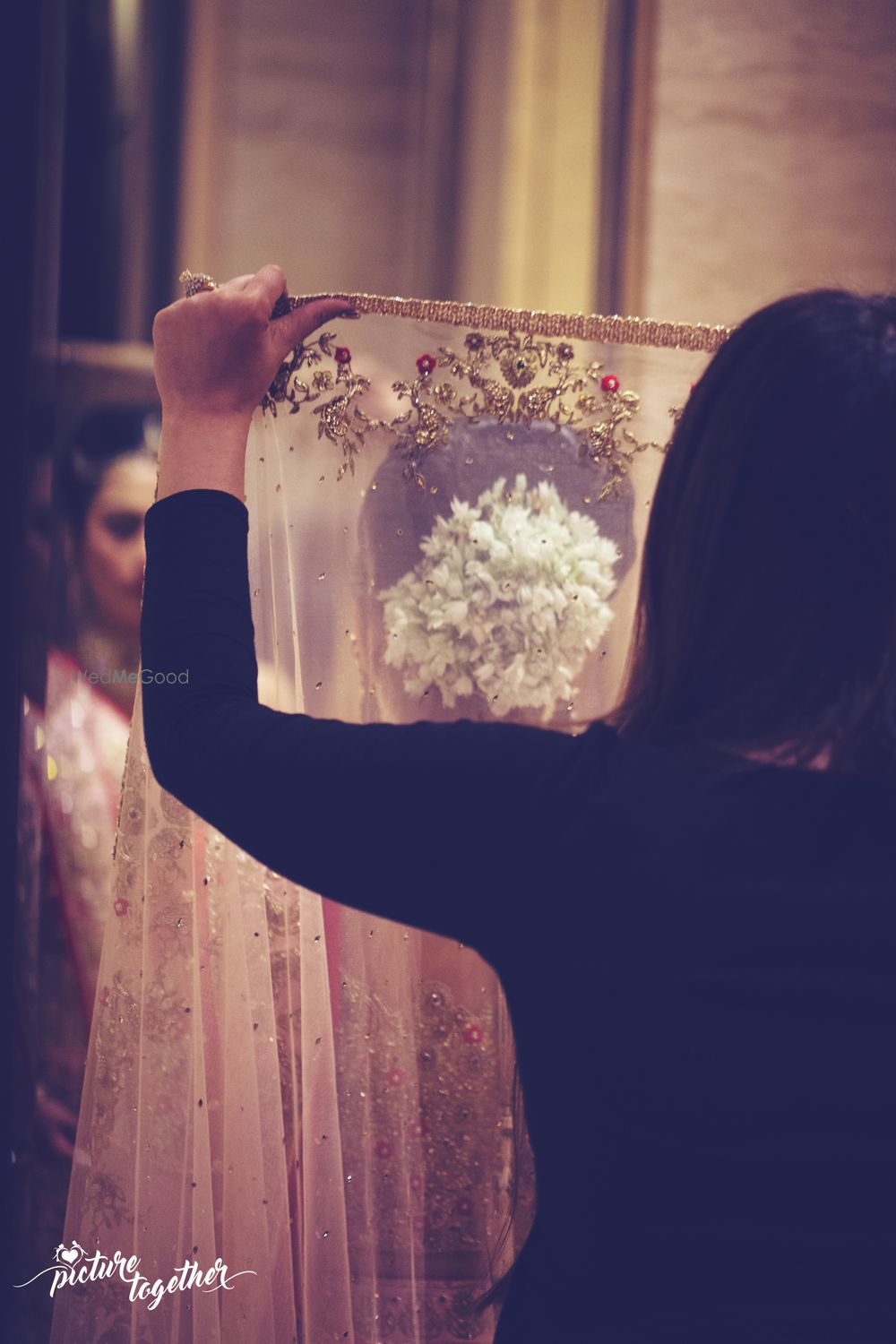 Photo of Bridal dupatta placing on head shot