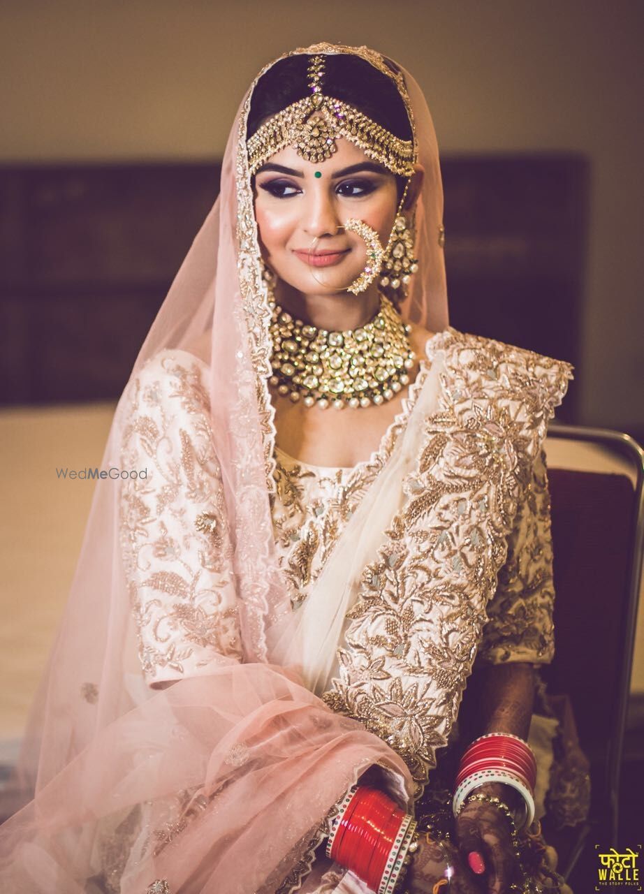 Photo of Pastel bridal lehenga look with Nath