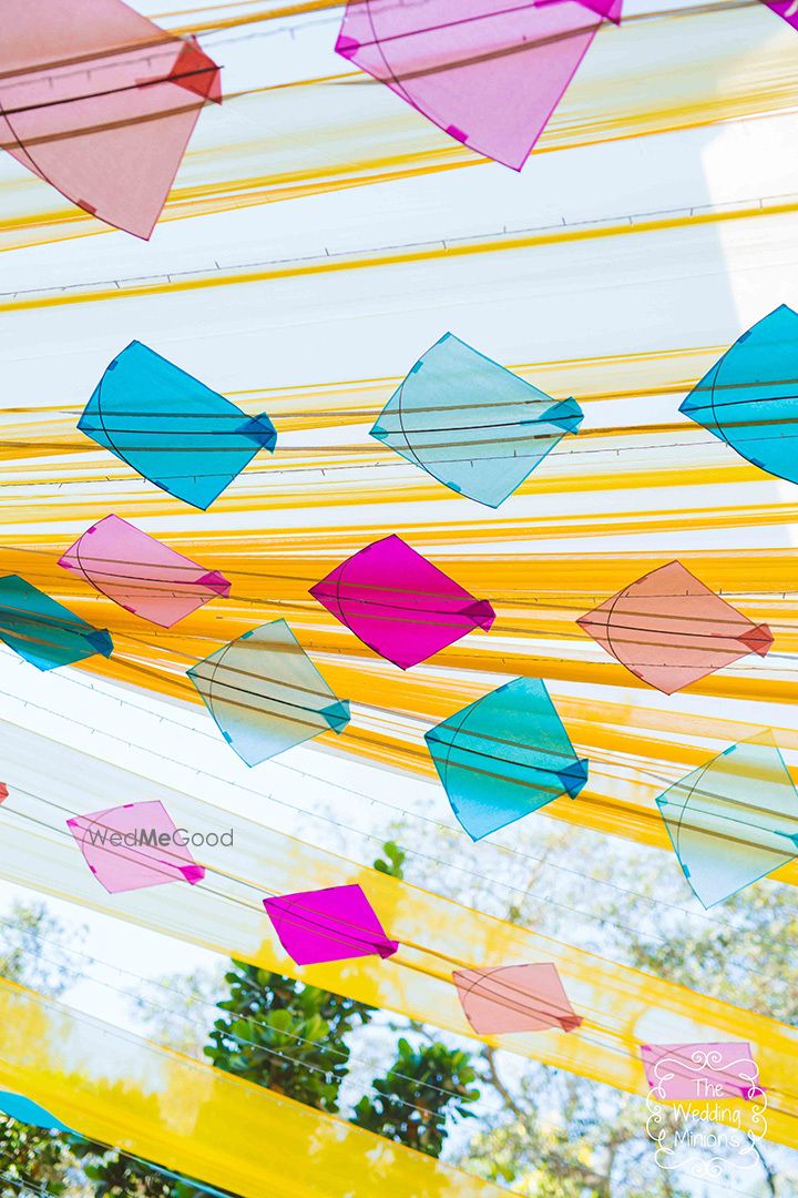 Photo of Kites with yellow drapes in mehendi decor