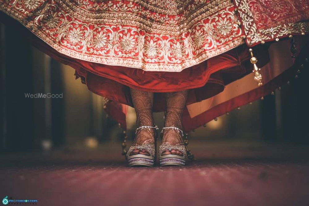 Photo of Silver bridal shoes with red lehenga