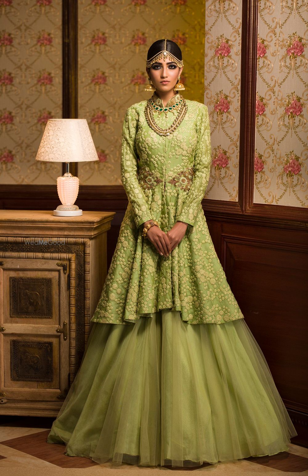 Photo of Light green layered jacket lehenga