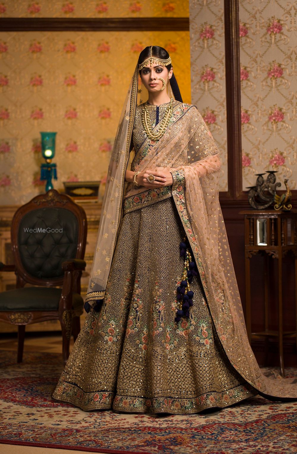 Photo of Beautiful peach and blue bridal lehnga