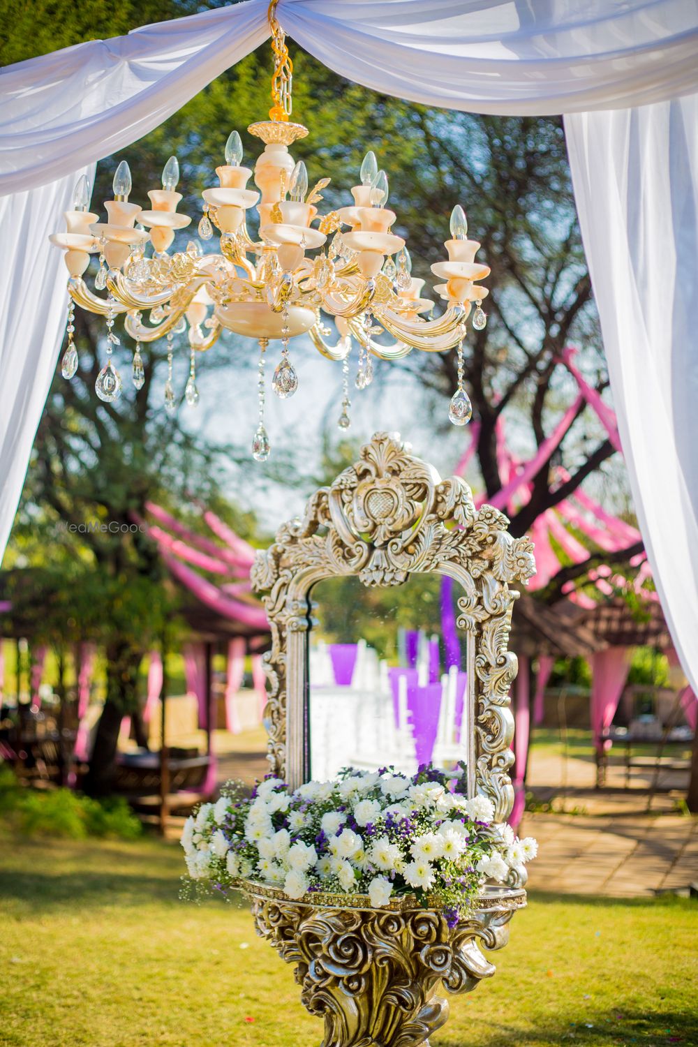 Photo of Entrance decor with dresser and chandelier