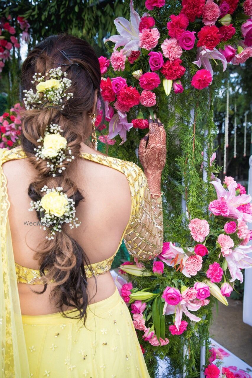 Photo of Pretty mehendi hairstyle braid with babys breath