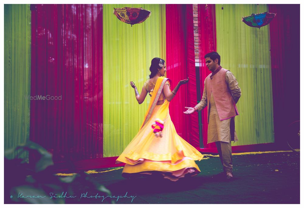 Photo of twirling brides