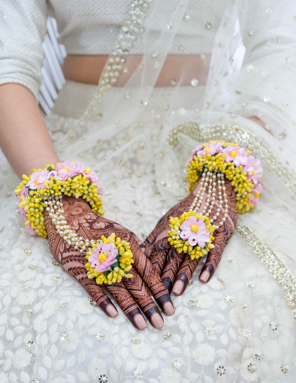 Photo of Dry floral yellow mehendi haathphool