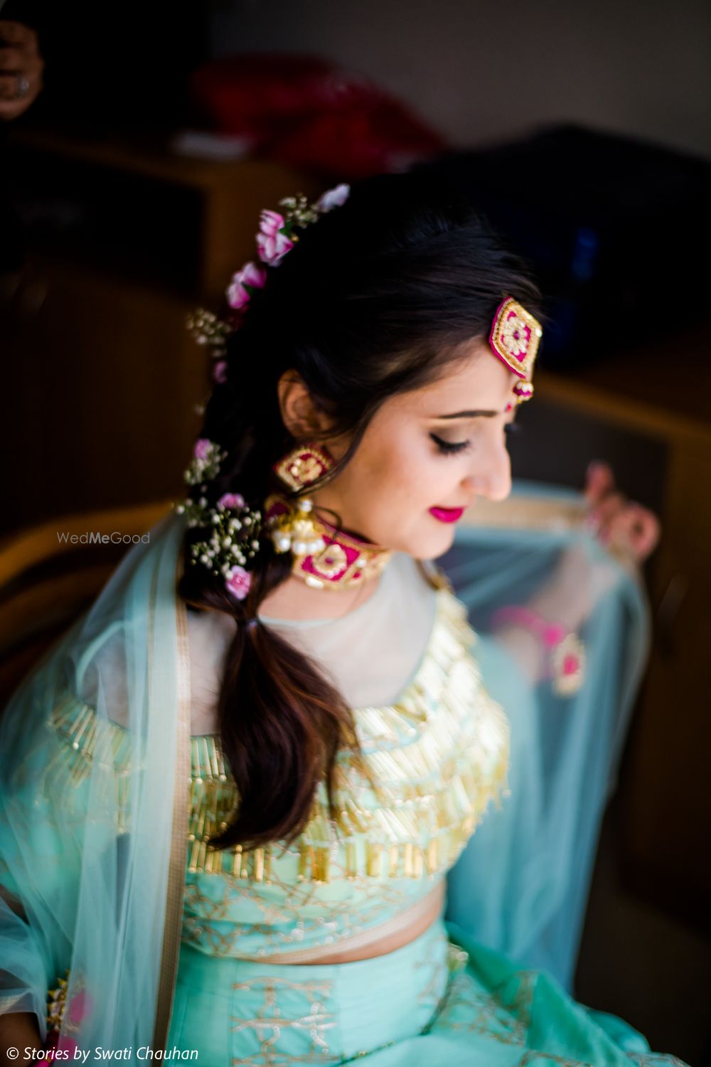 Photo of Short hairstyle with flowers in braid