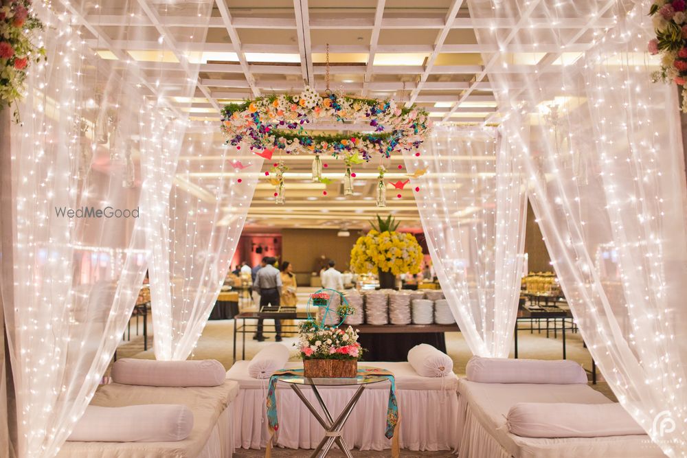 Photo of Sheer Curtains with Fairy Lights in Wedding Decor