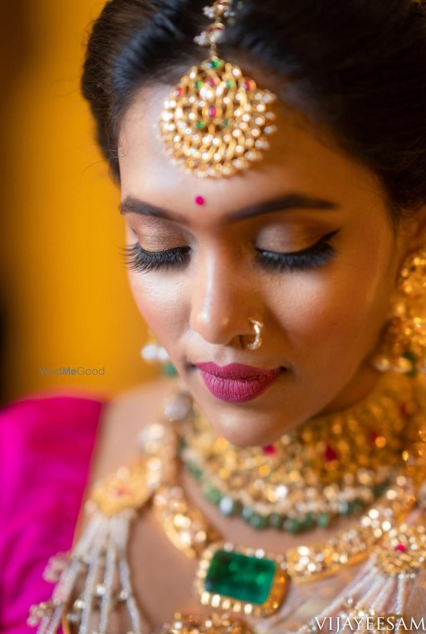 Photo of South indian bride with pink and brown makeup