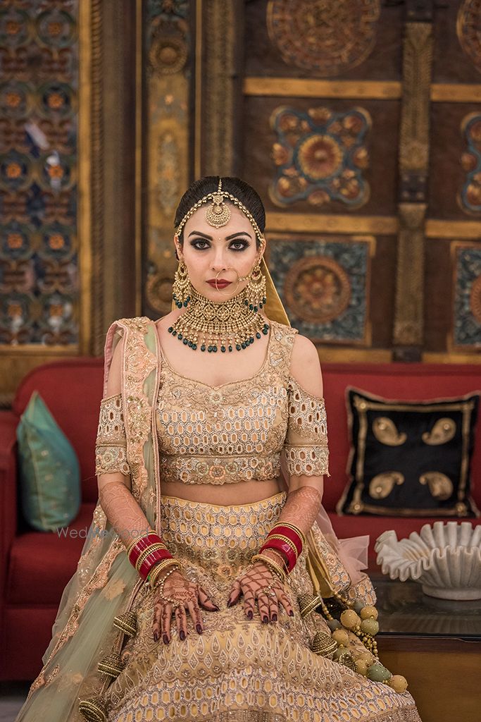 Photo of Beige lehenga cold shoulder blouse