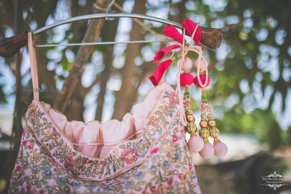 Photo of Lehenga with red latkans