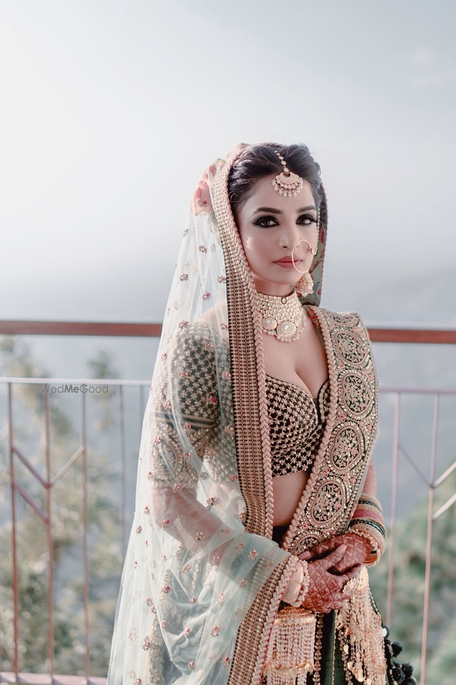 Photo of Teal bridal sabya lehenga with smokey eyes