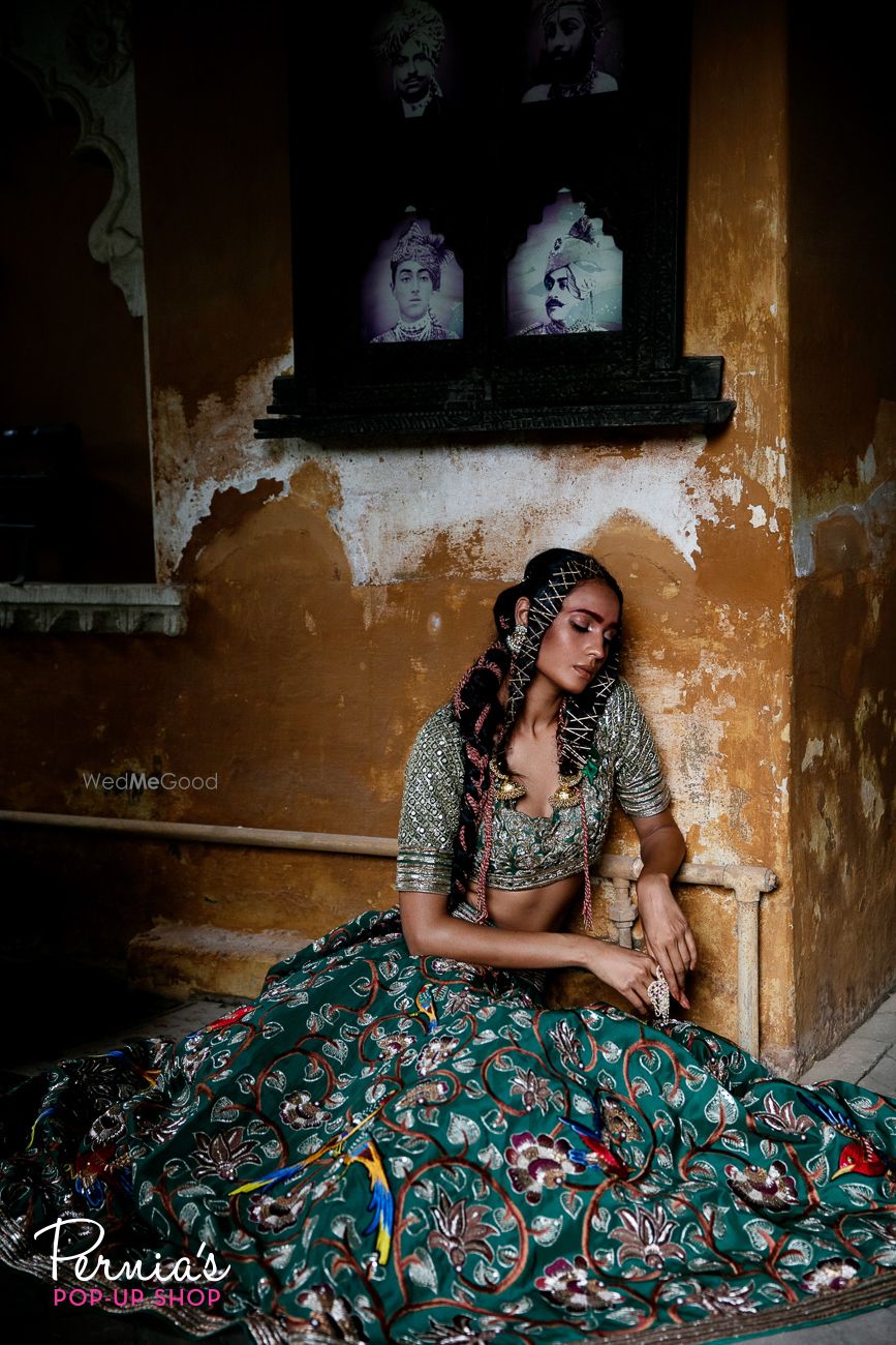 Photo of Dark green embroidered mehendi lehenga