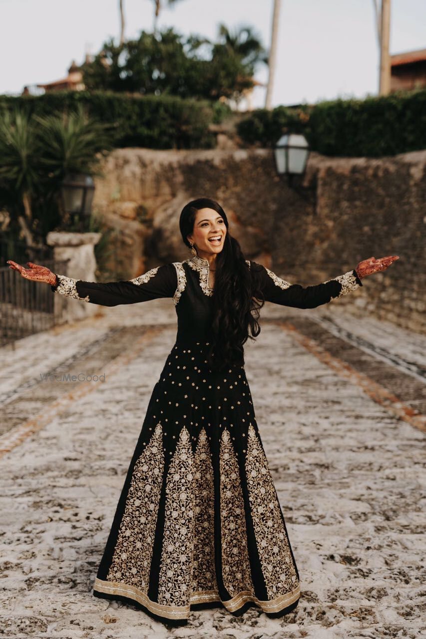 Photo of Black anarkali with silver motifs and thread work